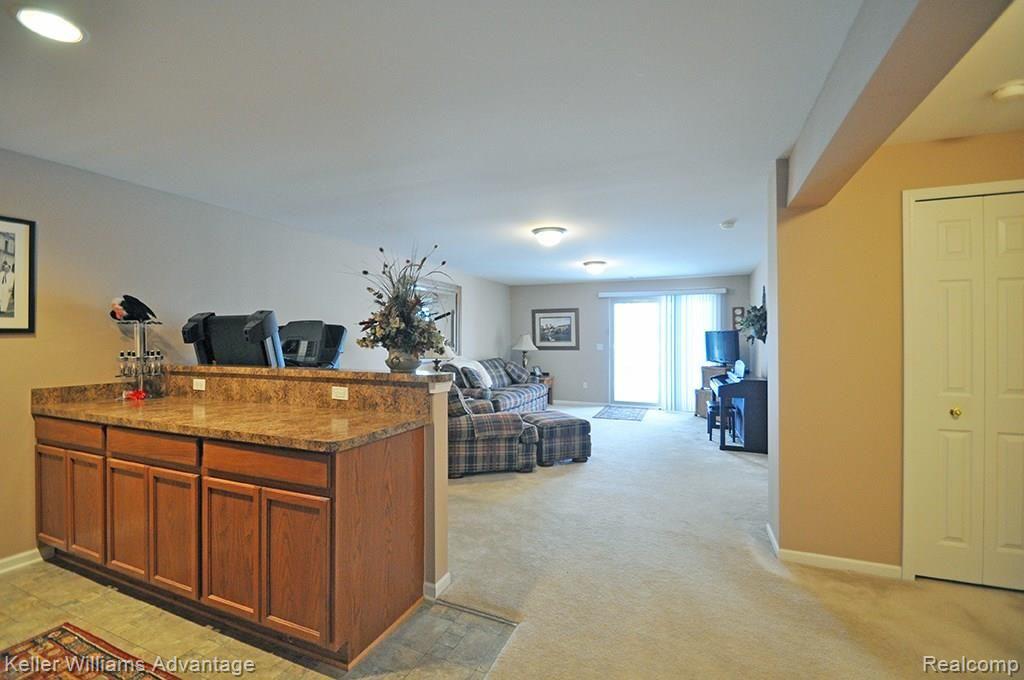 4690 Summer Ridge Drive Howell, MI 48843 - Photo 29 of 40 30_FamilyRoom_LL_1-1.jpg