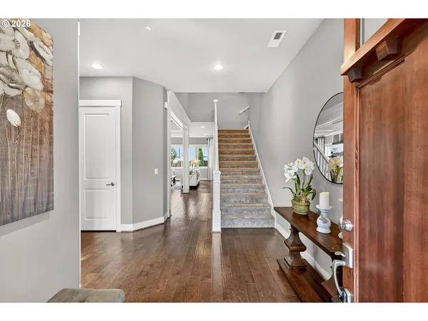 a view of entryway with wooden floor