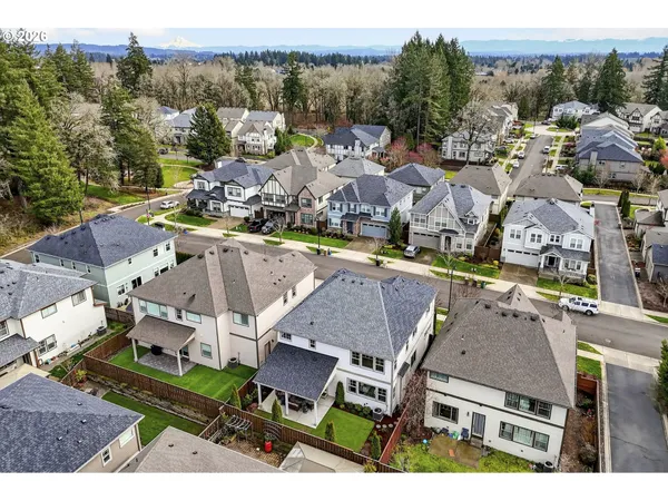 an aerial view of a houses with outdoor space