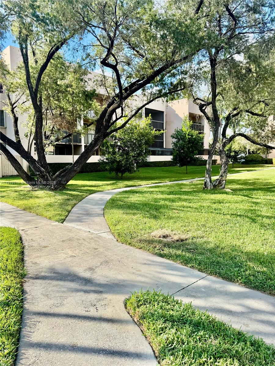 10985 Southwest 107th Street, Unit 216 Miami, FL 33176 - Photo 37 of 39 a view of a volley ball court