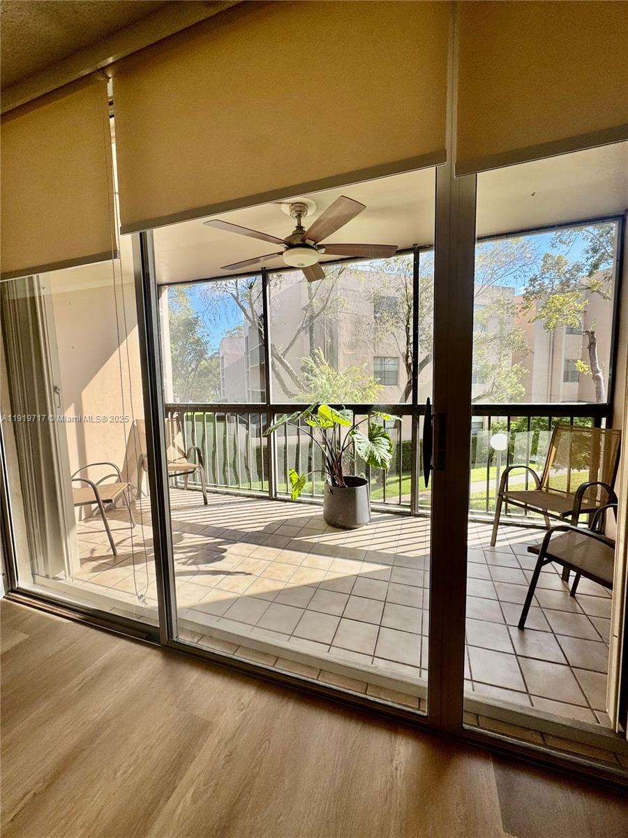 10985 Southwest 107th Street, Unit 216 Miami, FL 33176 - Photo 5 of 39 a view of front door with yard