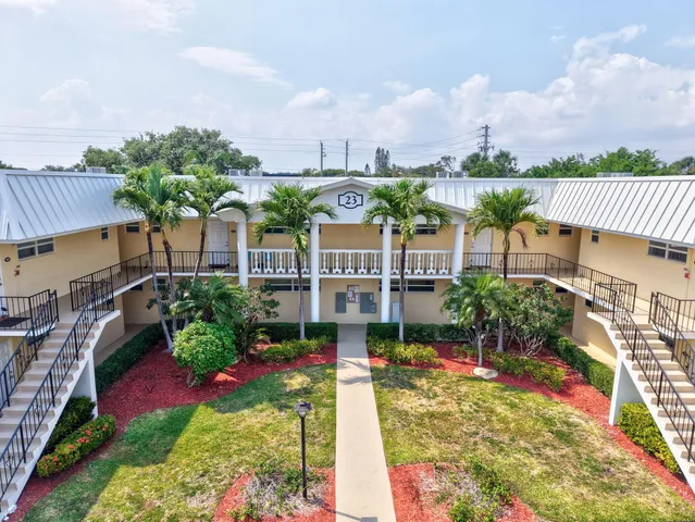 a front view of a house with a porch