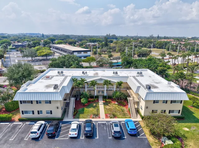 an aerial view of a house with a garden