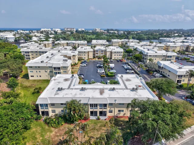 a view of dining room with furniture and wooden floor