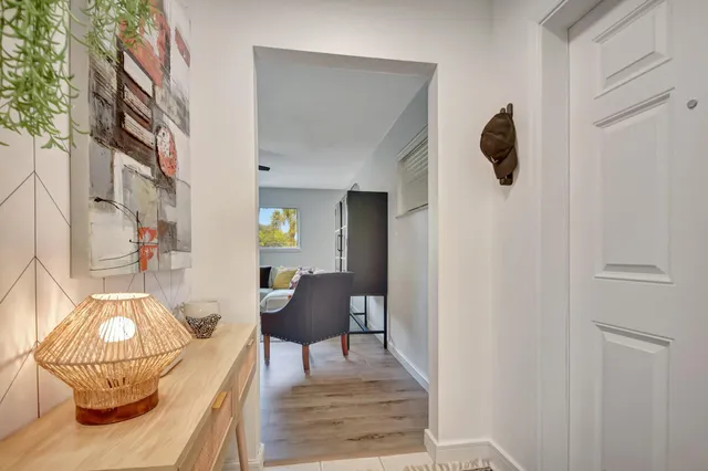a bedroom with a bed and a view of bathroom