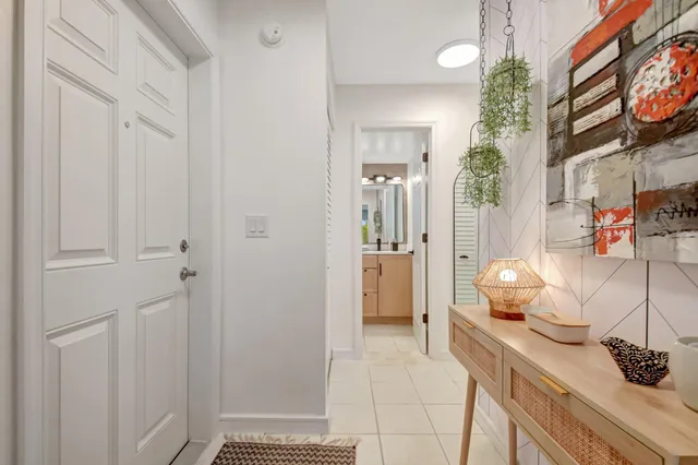 a kitchen with stainless steel appliances granite countertop a refrigerator sink and microwave