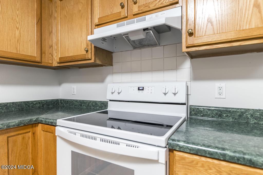 114 Wesleyan Way Macon, GA 31210 - Photo 12 of 28 a view of kitchen with washer and dryer