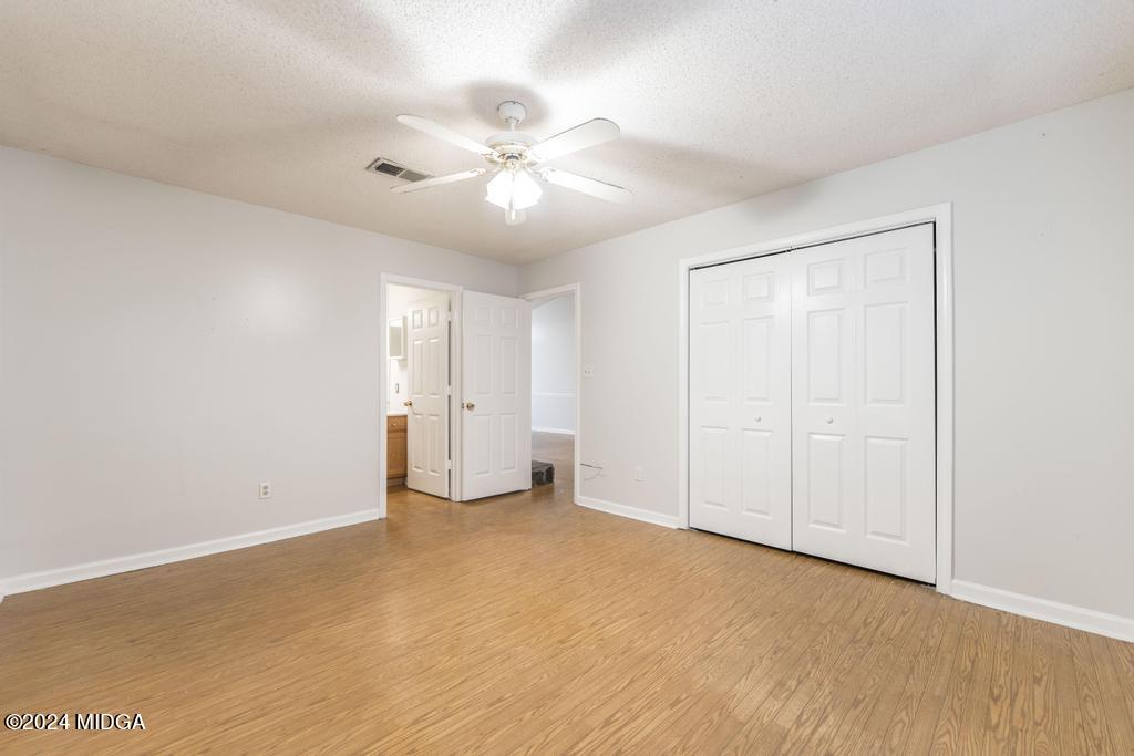114 Wesleyan Way Macon, GA 31210 - Photo 16 of 28 wooden floor in an empty room