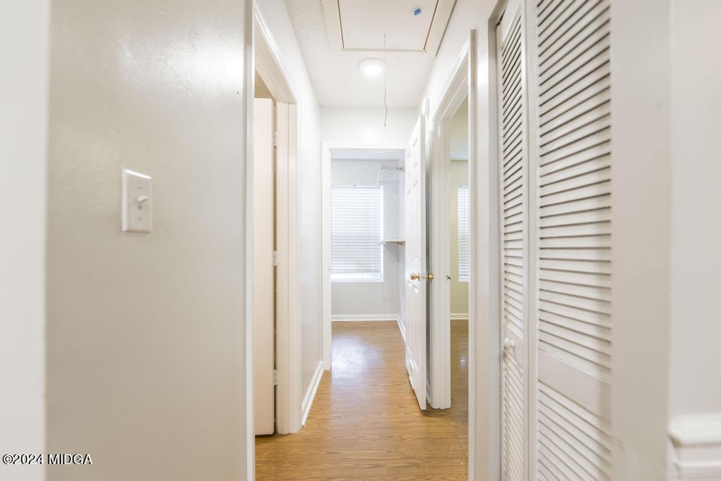 114 Wesleyan Way Macon, GA 31210 - Photo 20 of 28 a view of a hallway with wooden floor