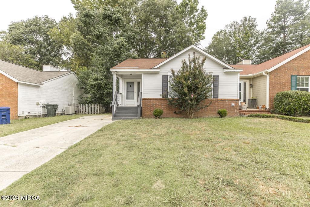 114 Wesleyan Way Macon, GA 31210 - Photo 2 of 28 a view of a house with backyard and trees