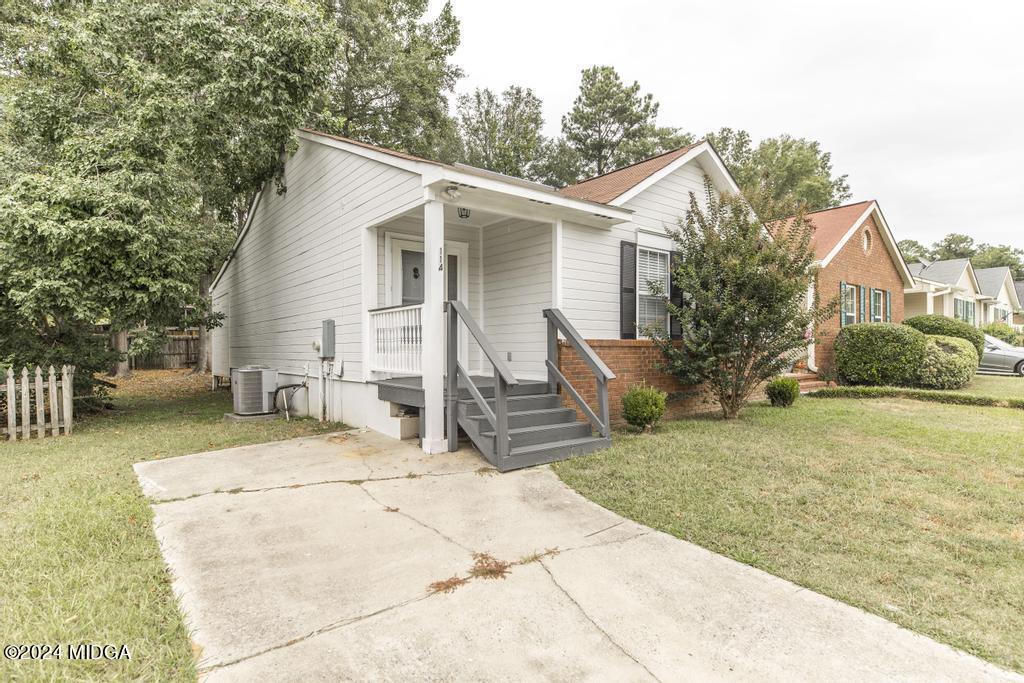 114 Wesleyan Way Macon, GA 31210 - Photo 3 of 28 a view of a house with a patio