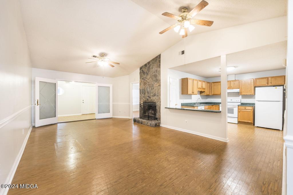 114 Wesleyan Way Macon, GA 31210 - Photo 6 of 28 a view of an empty room with a kitchen