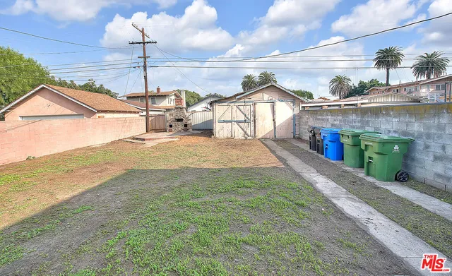 a spacious bathroom with a sink a mirror and shower
