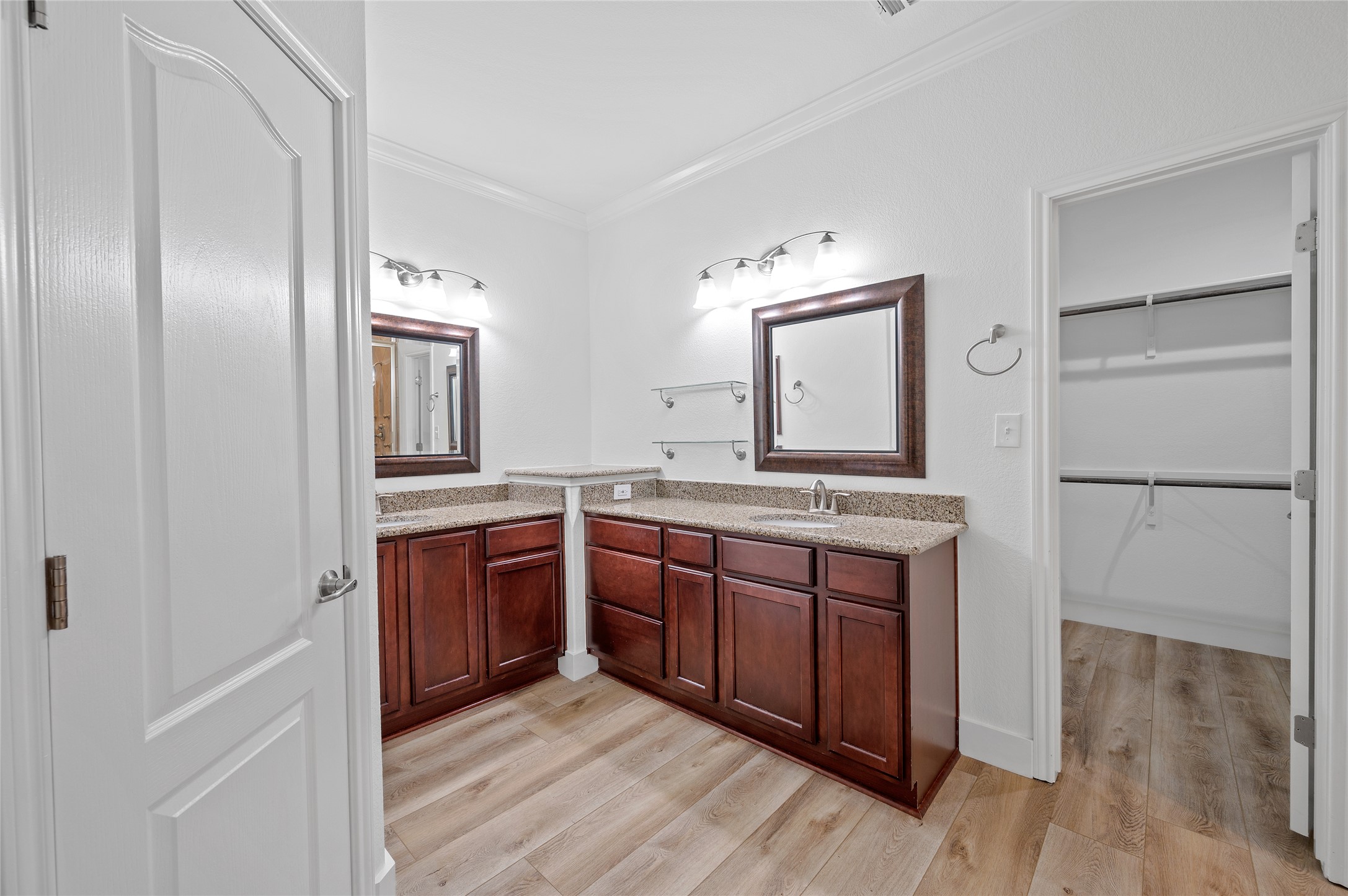 4512 Pyrenees Pass Bee Cave, TX 78738 - Photo 19 of 35 a spacious bathroom with a granite countertop sink and a mirror