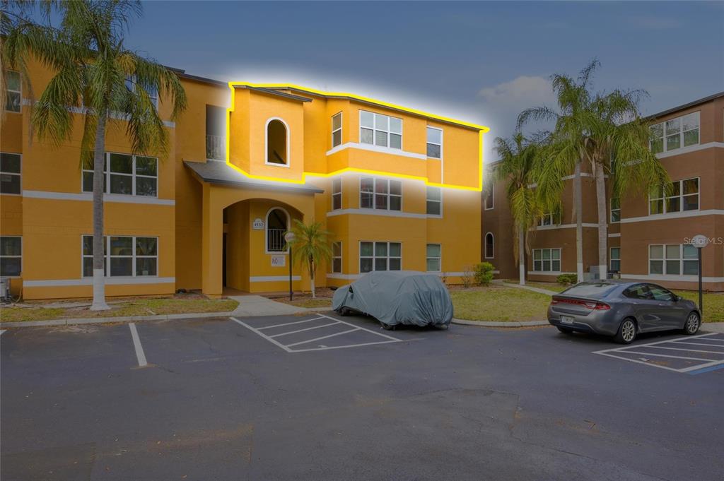 4532 Commander Drive, Unit 2132 Orlando, FL 32822 - Photo 2 of 26 a car parked in front of a building