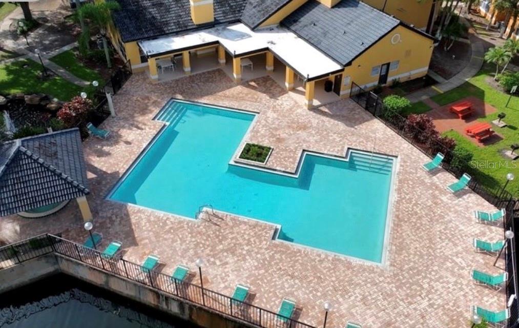 4532 Commander Drive, Unit 2132 Orlando, FL 32822 - Photo 21 of 26 an aerial view of a house with garden space and street view