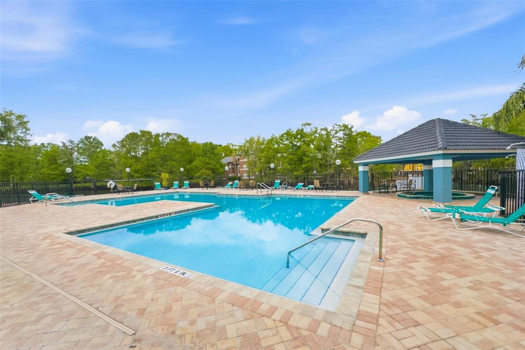 4532 Commander Drive, Unit 2132 Orlando, FL 32822 - Photo 26 of 26 a view of swimming pool with lounge chair