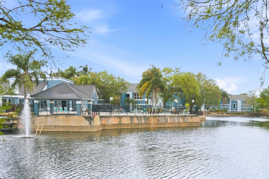 4532 Commander Drive, Unit 2132 Orlando, FL 32822 - Photo 3 of 26 a view of a swimming pool with a patio