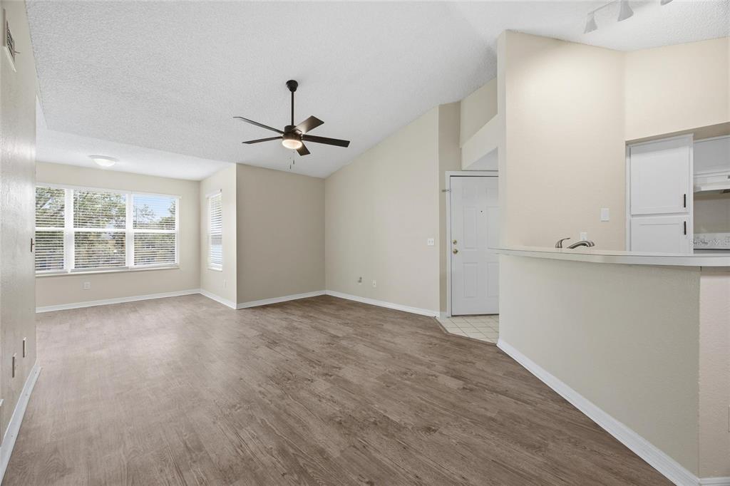 4532 Commander Drive, Unit 2132 Orlando, FL 32822 - Photo 9 of 26 a view of an empty room with a window