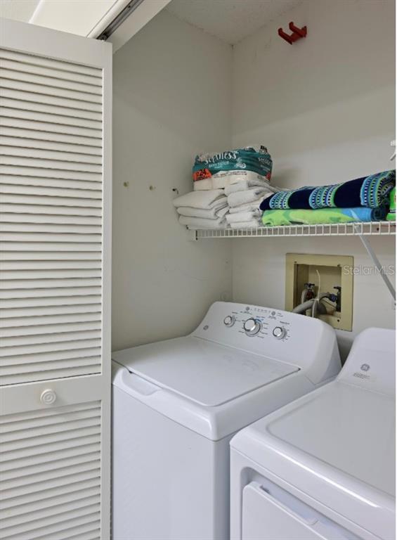 6501 Stone River Road, Unit 303 Bradenton, FL 34203 - Photo 14 of 30 a utility room with dryer and washer