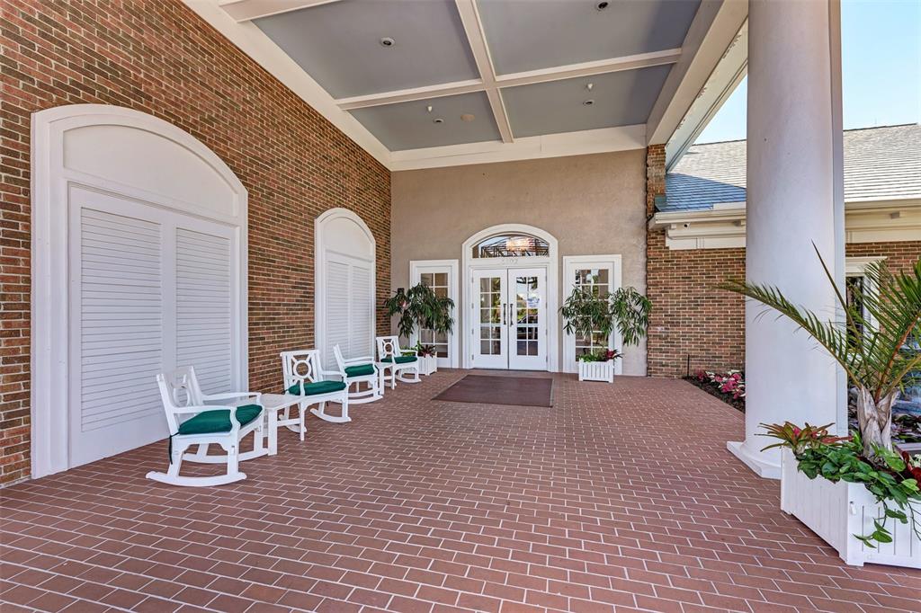 6501 Stone River Road, Unit 303 Bradenton, FL 34203 - Photo 23 of 30 a view of pool with outdoor seating