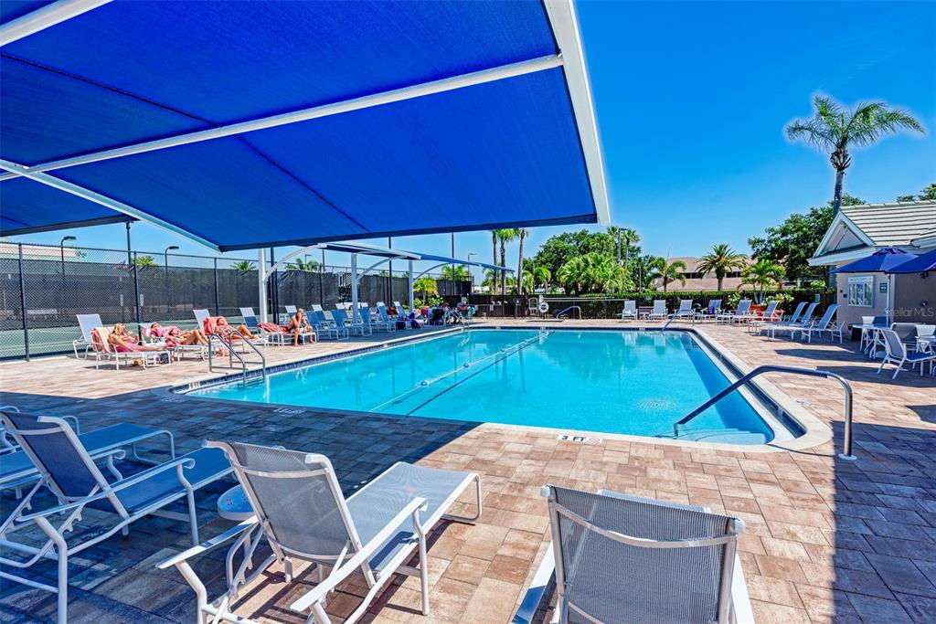 6501 Stone River Road, Unit 303 Bradenton, FL 34203 - Photo 30 of 30 a view of an chairs and table in the patio