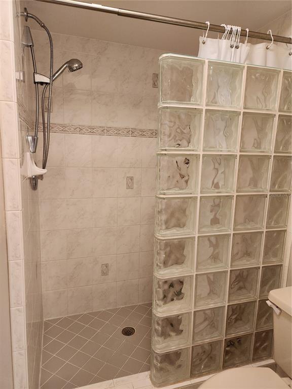6501 Stone River Road, Unit 303 Bradenton, FL 34203 - Photo 9 of 30 a bathroom with a shower