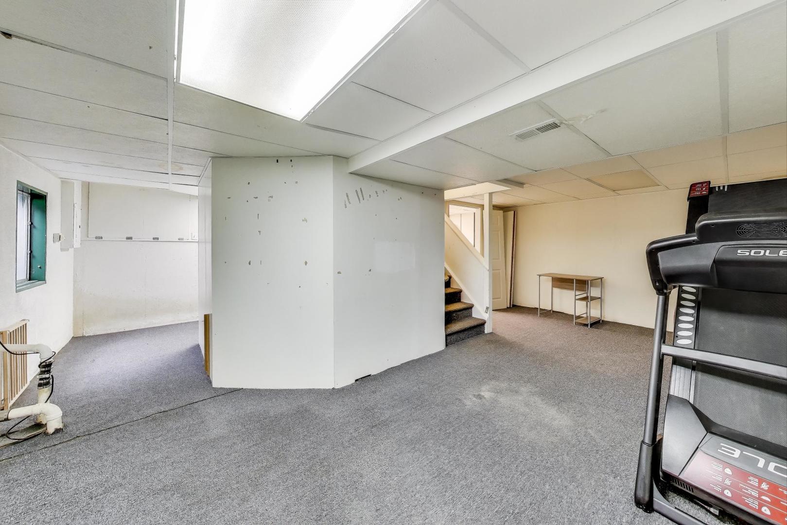 5370 Sequoia Court Gurnee, IL 60031 - Photo 19 of 29 a view of a room with gym equipment