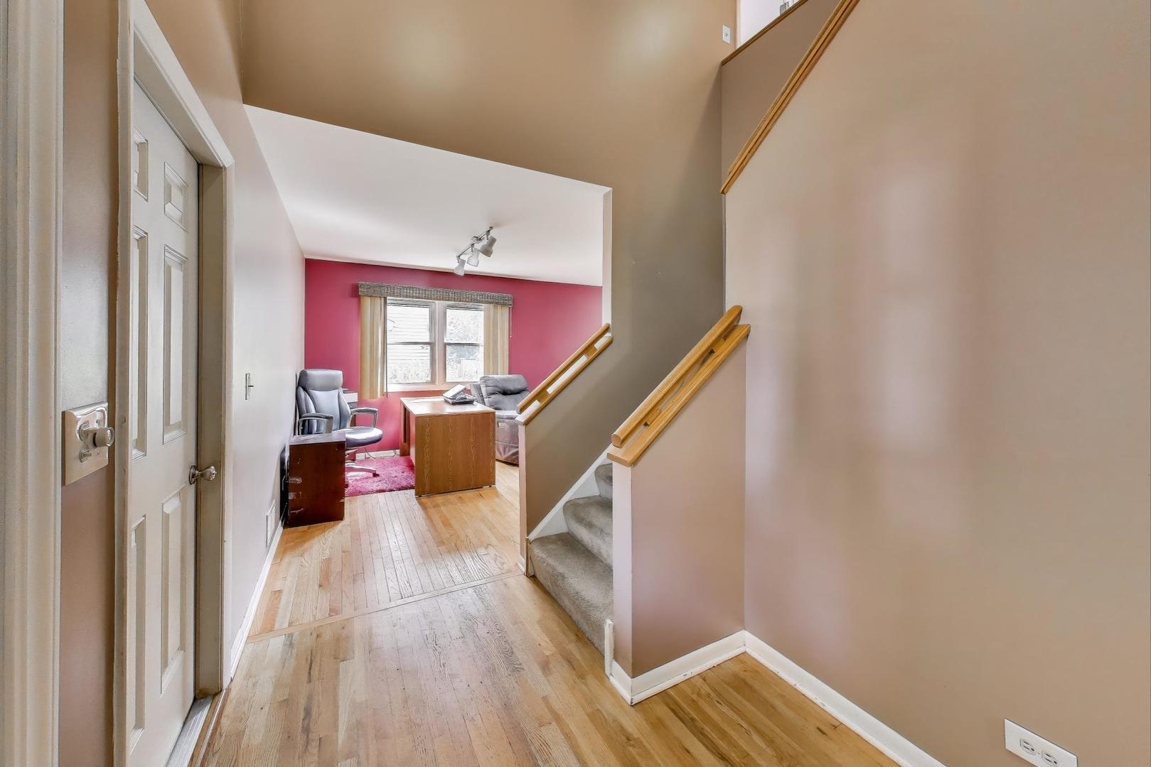 5370 Sequoia Court Gurnee, IL 60031 - Photo 2 of 29 a living room with furniture and a wooden floor