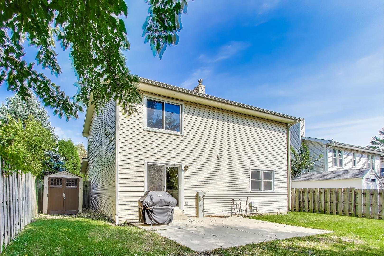 5370 Sequoia Court Gurnee, IL 60031 - Photo 21 of 29 a backyard of a house with seating space