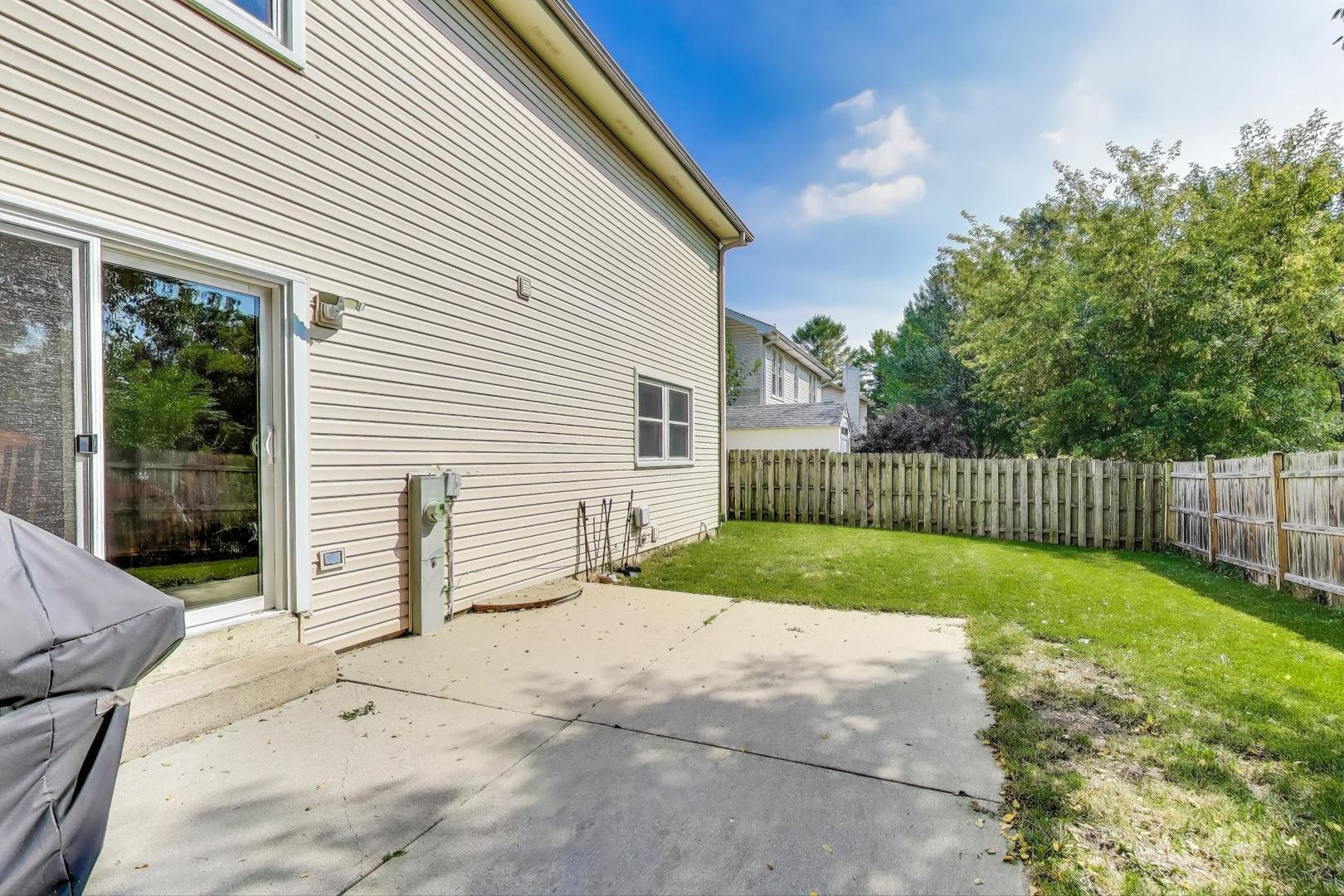 5370 Sequoia Court Gurnee, IL 60031 - Photo 23 of 29 a view of backyard with garden and plants