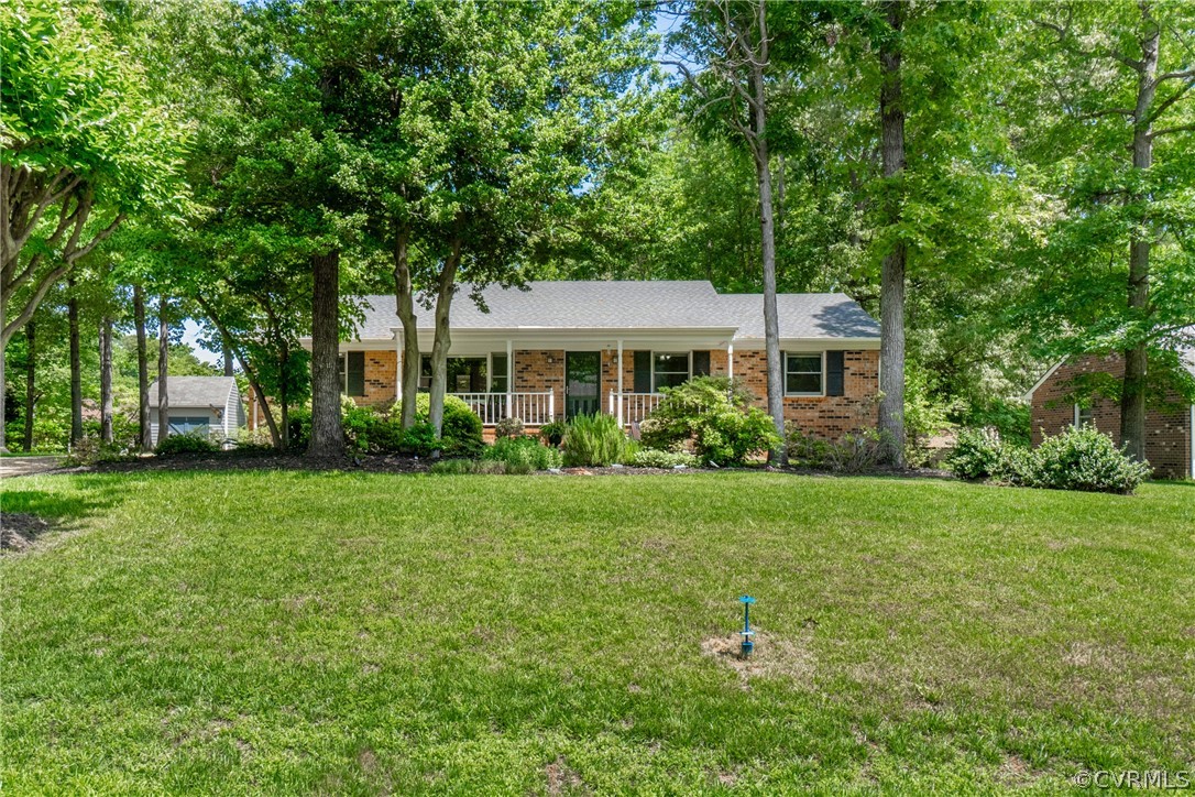 3506 Ludgate Road Chester, VA 23831 - Photo 1 of 22 a view of a house with backyard and sitting area