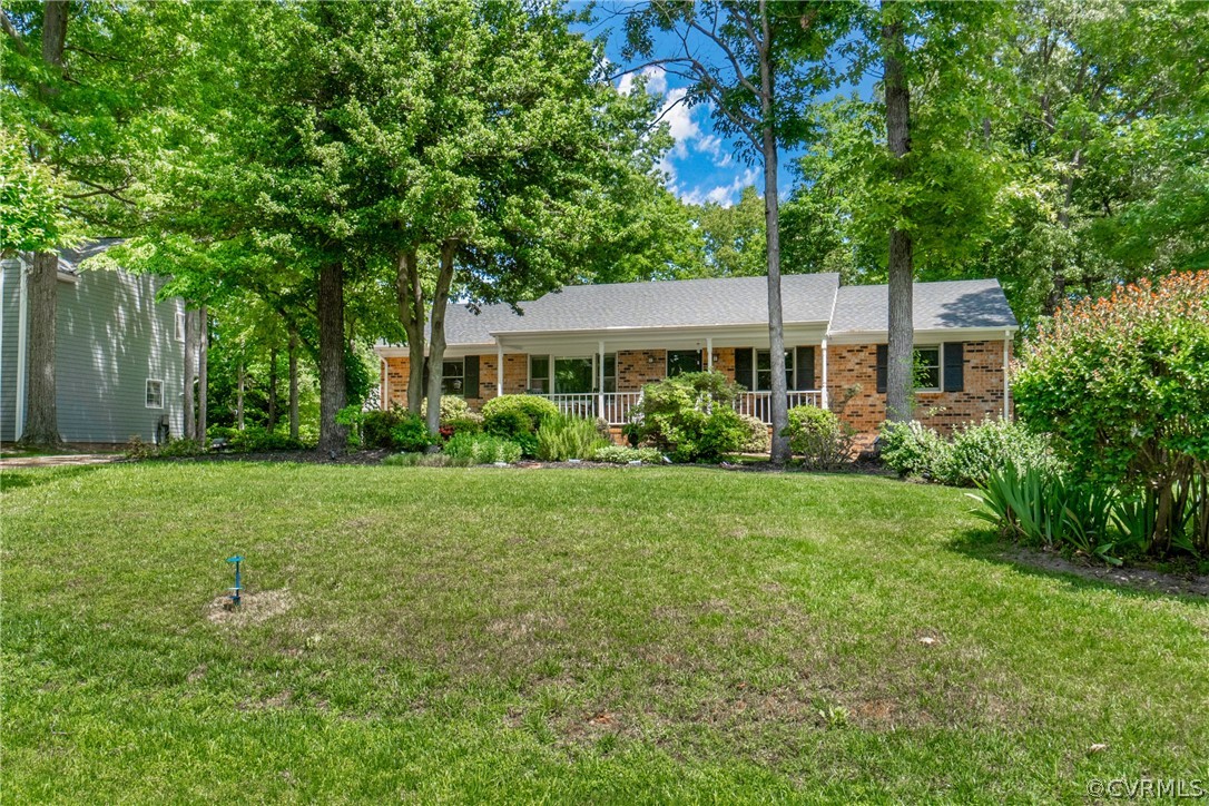 3506 Ludgate Road Chester, VA 23831 - Photo 3 of 22 a front view of a house with a yard