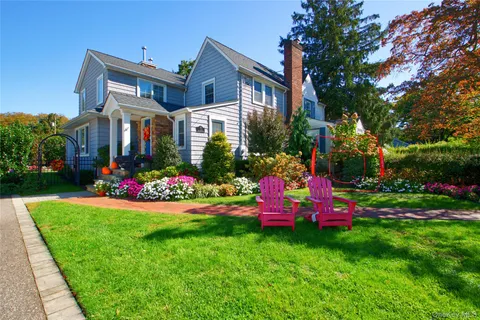 a front view of a building with garden