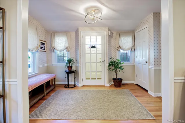 a bedroom with bed and a window