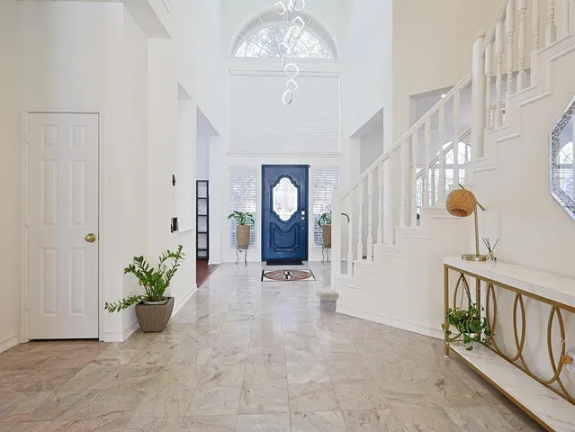 a kitchen with counter top space sink and center island