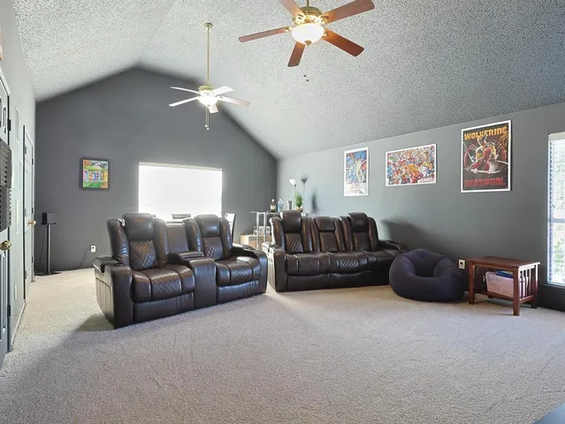 a view of a hallway with dining area and livingroom view