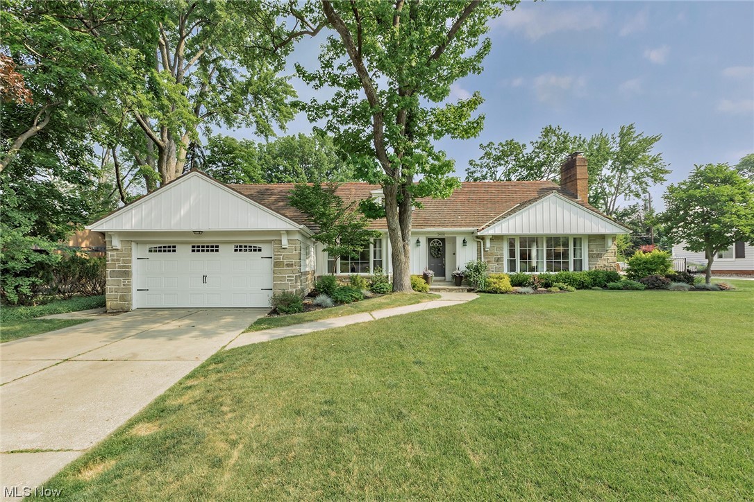 24101 Hazelmere Road Beachwood, OH 44122 - Photo 1 of 25 A pristine exterior comprised of a lush landscape with stone walls and a tiled roof set the scene for this oasis.