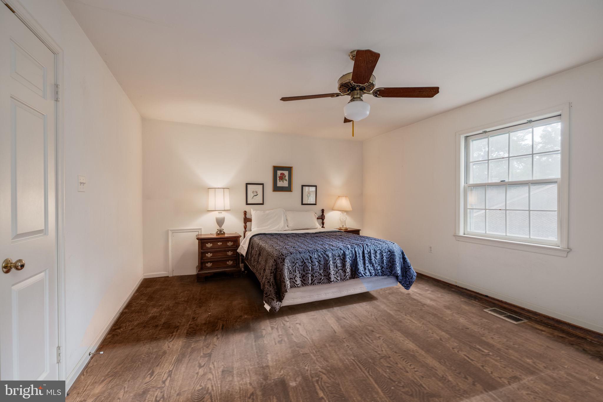 8009 Hackamore Drive Potomac, MD 20854 - Photo 11 of 19 Primary suite with walk-in closet and sitting area