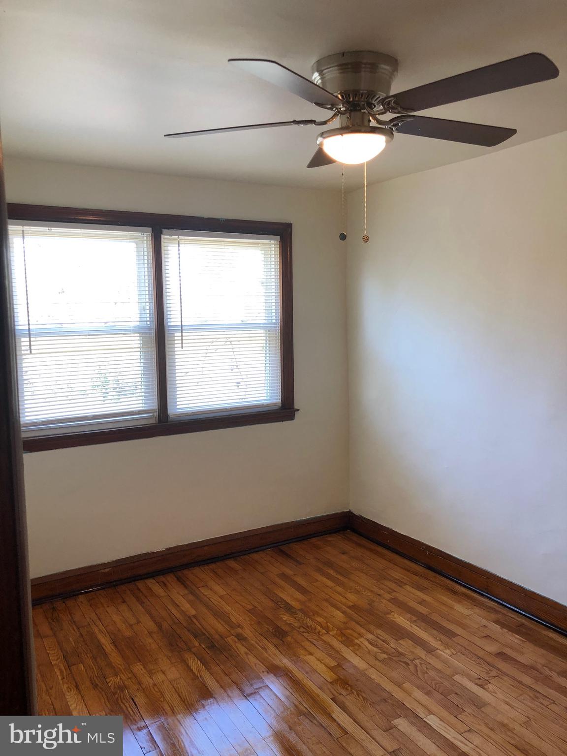 319 Grove Park Road Baltimore, MD 21225 - Photo 11 of 59 Double window, new blinds and ceiling fans