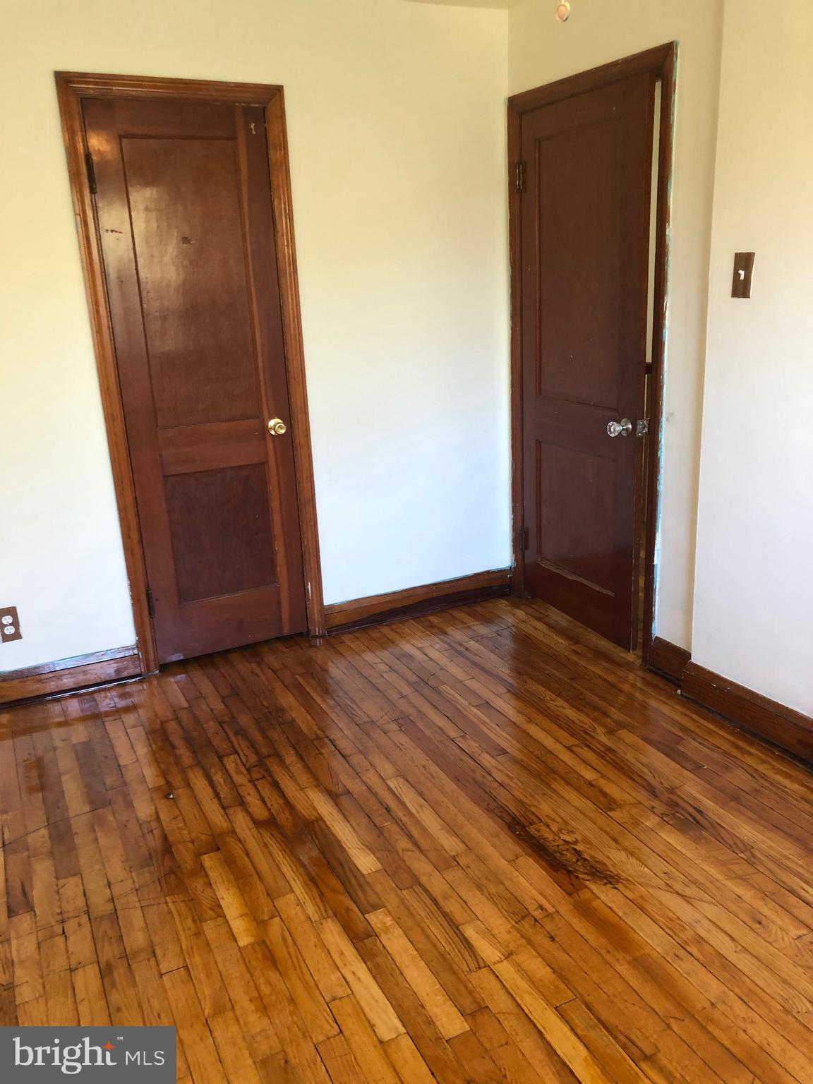 319 Grove Park Road Baltimore, MD 21225 - Photo 13 of 59 Bedroom with high gloss floors