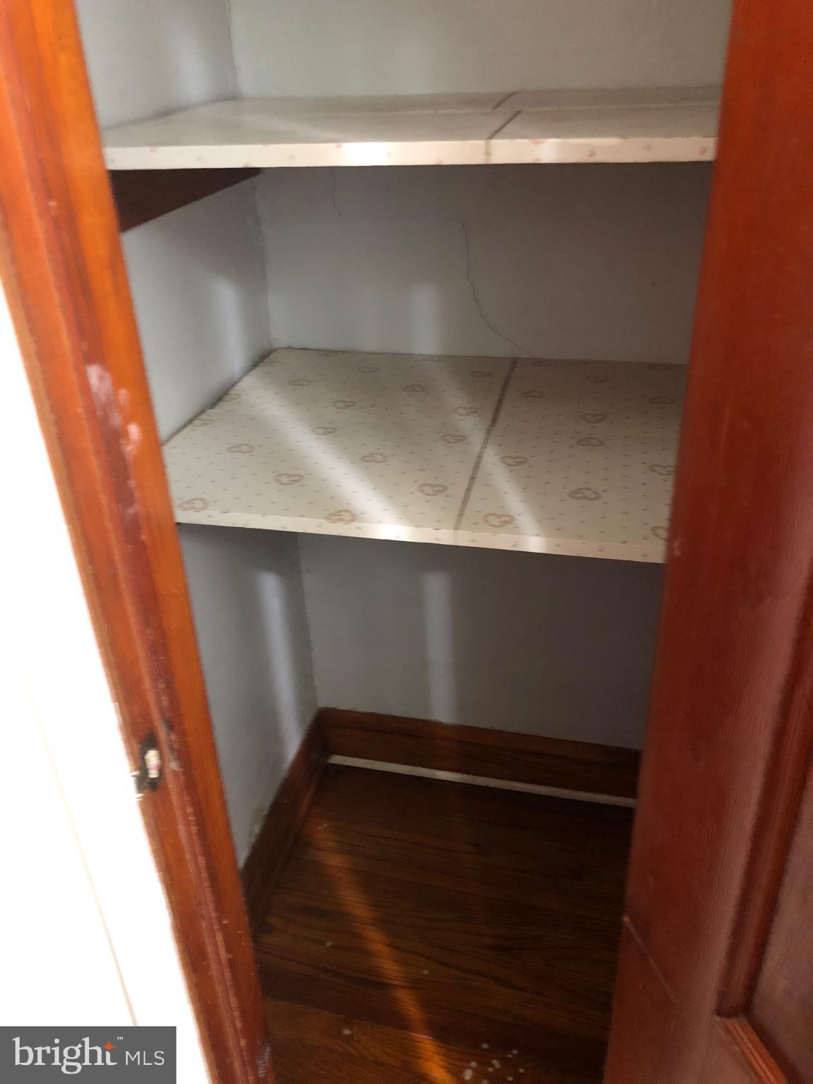 319 Grove Park Road Baltimore, MD 21225 - Photo 14 of 59 Linen cabinet inside bathroom