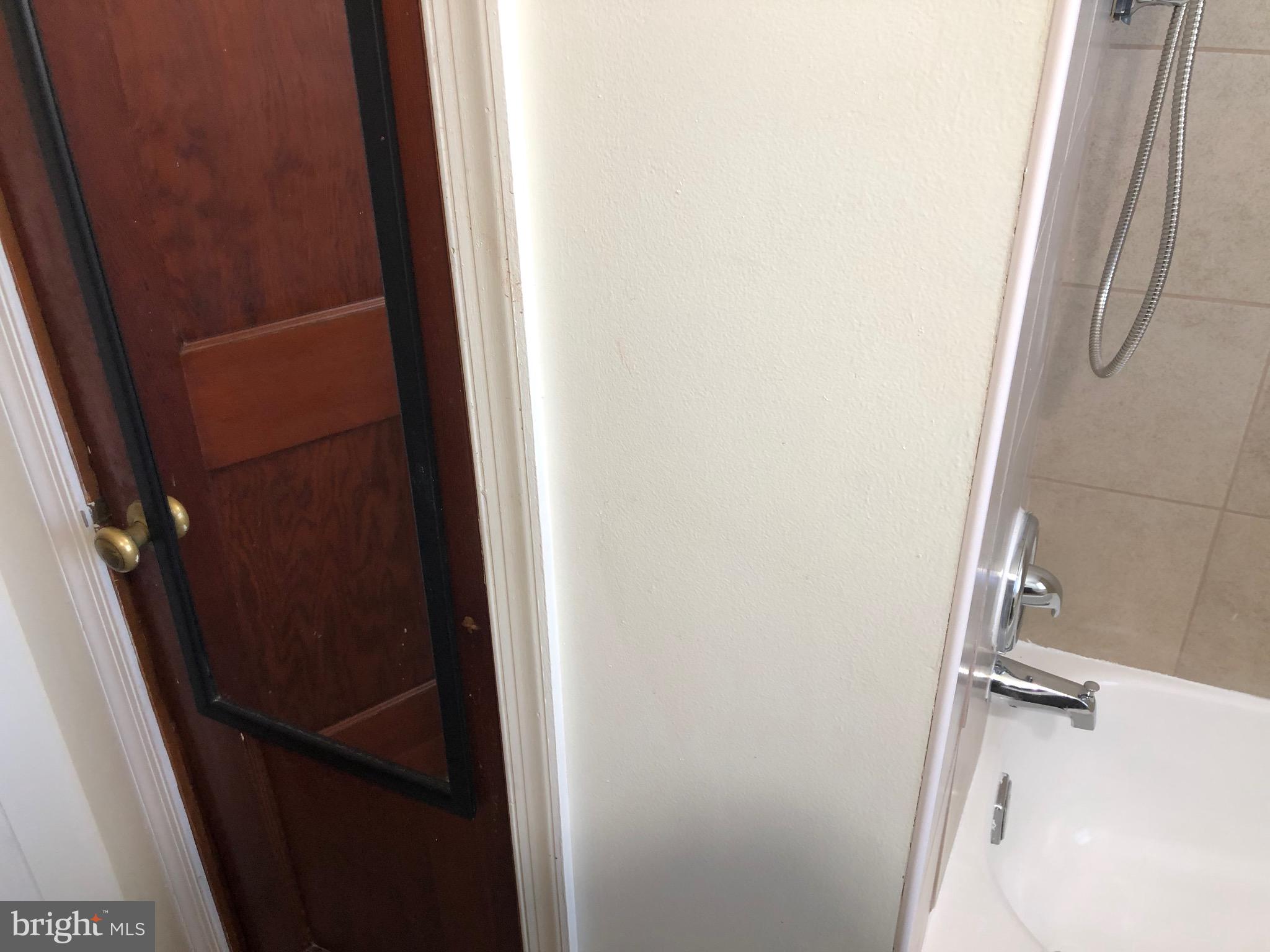 319 Grove Park Road Baltimore, MD 21225 - Photo 15 of 59 Upper level bathroom