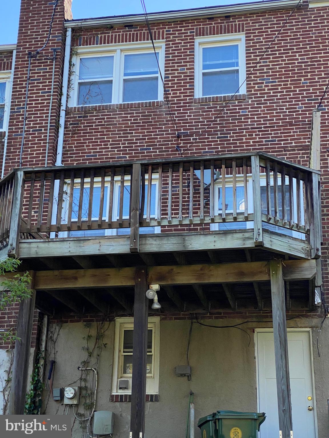 319 Grove Park Road Baltimore, MD 21225 - Photo 30 of 59 Rear view, patio and deck