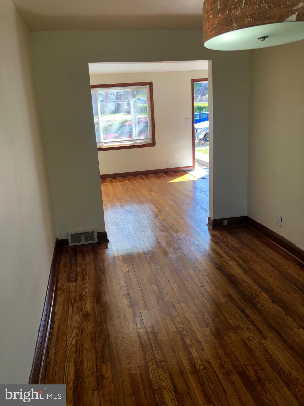 319 Grove Park Road Baltimore, MD 21225 - Photo 32 of 59 dining room view to living room
