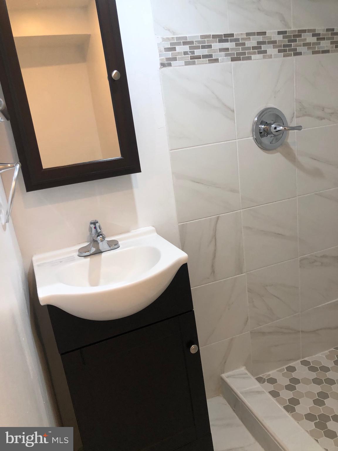319 Grove Park Road Baltimore, MD 21225 - Photo 33 of 59 Ceramic tile