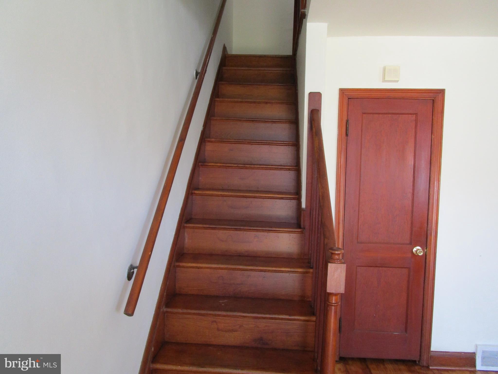 319 Grove Park Road Baltimore, MD 21225 - Photo 47 of 59 Stairwell to upstairs bedroom area