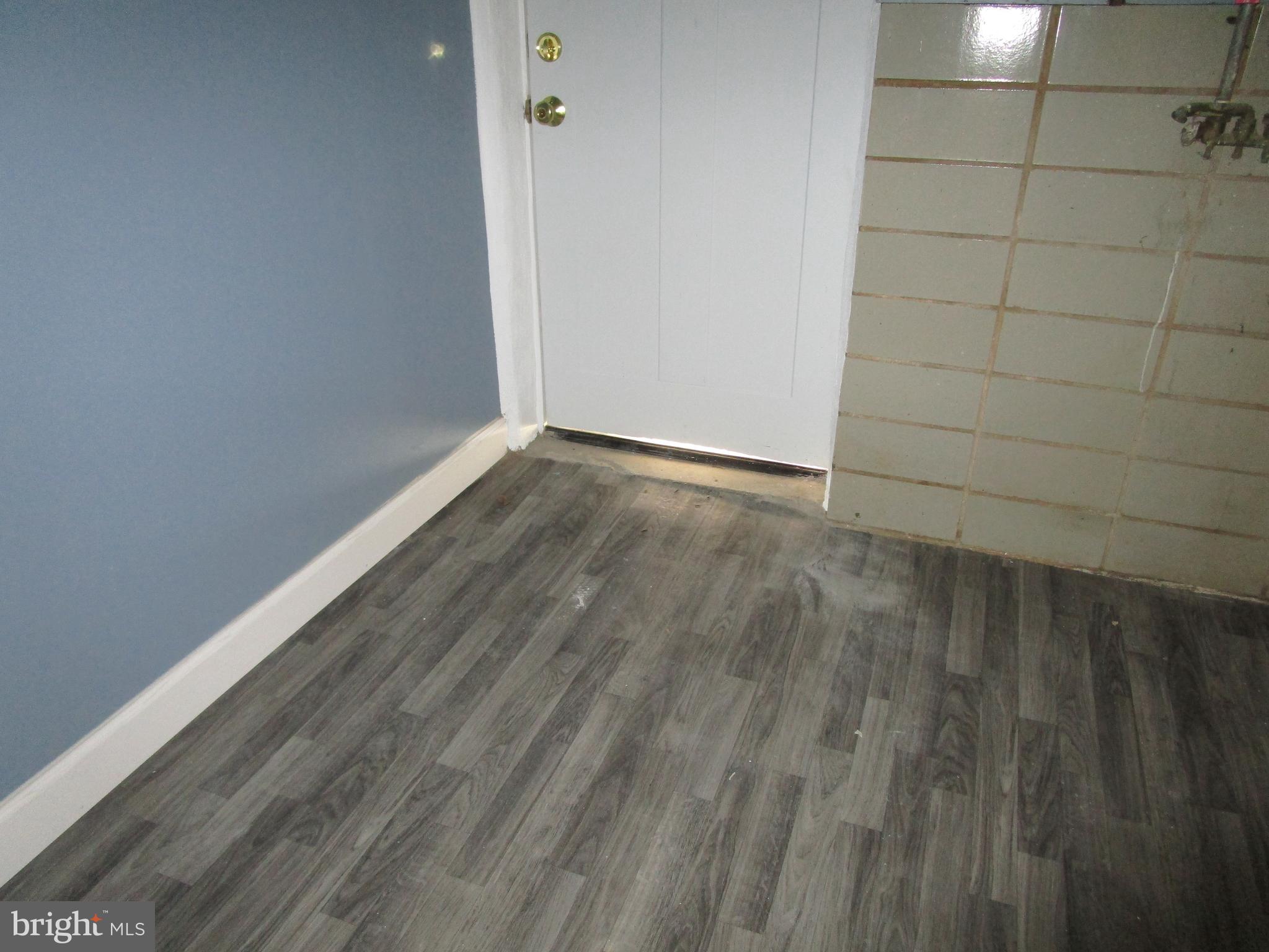 319 Grove Park Road Baltimore, MD 21225 - Photo 50 of 59 laundry/utility room to back door.