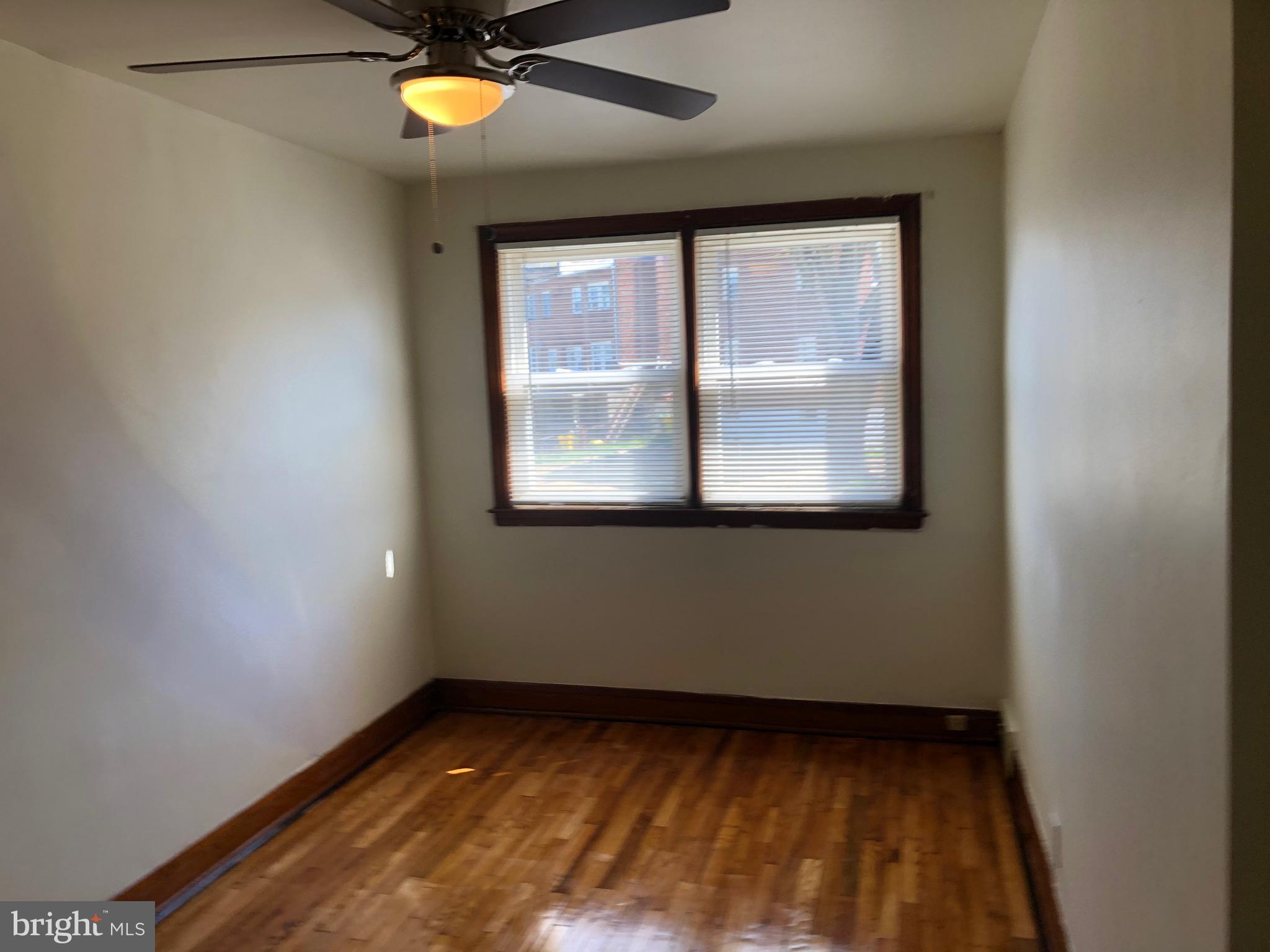 319 Grove Park Road Baltimore, MD 21225 - Photo 10 of 59 Ceiling fans in every room, Fresh Paint throughout