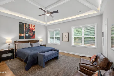 a bedroom with a bed furniture and a window